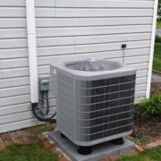 an hvac unit installed on the side of a house