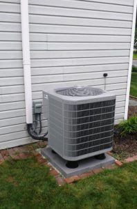 an hvac unit installed on the side of a house