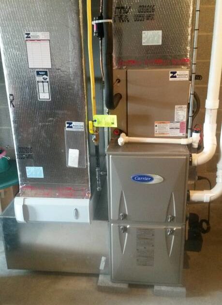 new gas furnace and air conditioner coil installed in a home