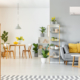 a gray room with yellow accents with a ductless mitsubishi system on the wall