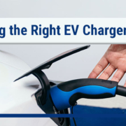 a person is charging an electric car with a blue and black charger