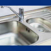 a stainless steel kitchen sink