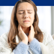 a woman with her eyes closed is holding her throat