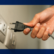 person plugging in an appliance